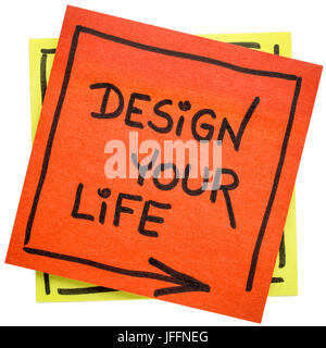 Design your life inspirational reminder - handwriting on an isolated sticky note Stock Photo