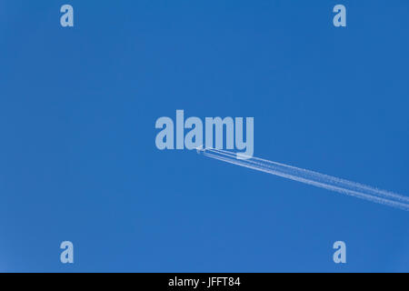 Airliner flying high Stock Photo