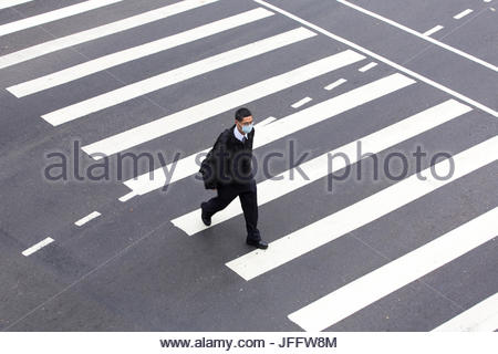 Download A Pedestrian Wearing A Face Mask Walk Past The French Christian Dior Luxury Goods Logo Seen In Hong Kong Stock Photo Alamy PSD Mockup Templates