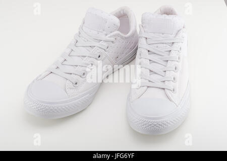Pair of white Converse Chuck Taylor All Star shoes Stock Photo