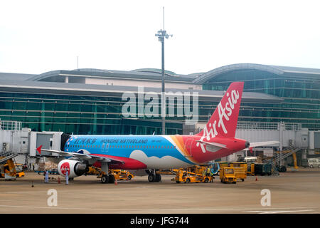 AirAsia airlines Airbus A320-216 airplane being loaded at airport Stock Photo