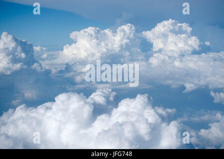 Photo taken above the clouds with blue sky Stock Photo