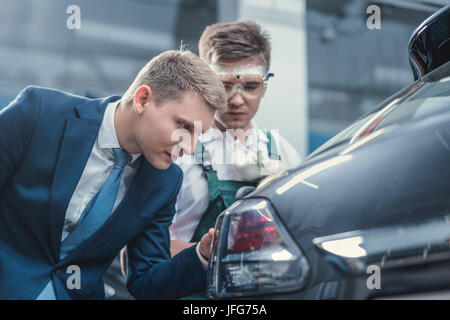 Car repair in garage Stock Photo