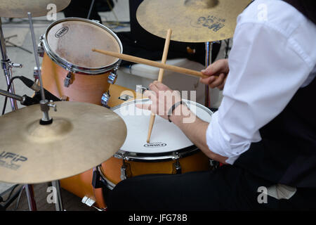 Close up of drummer playing drums Stock Photo