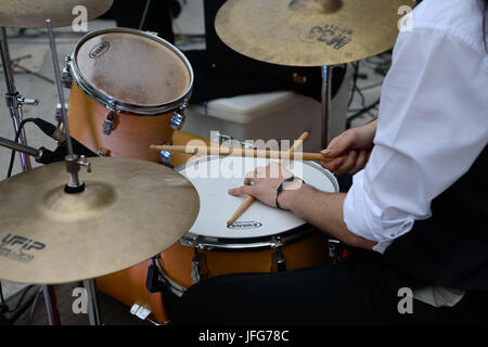 Close up of drummer playing drums Stock Photo