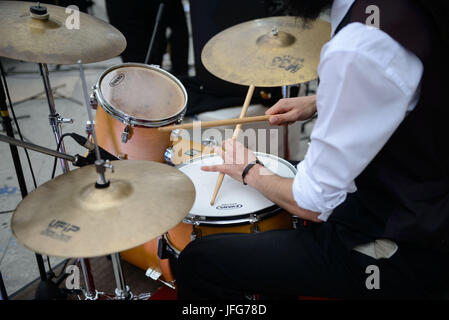 Close up of drummer playing drums Stock Photo