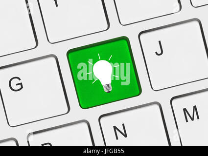 Computer keyboard with lamp key Stock Photo