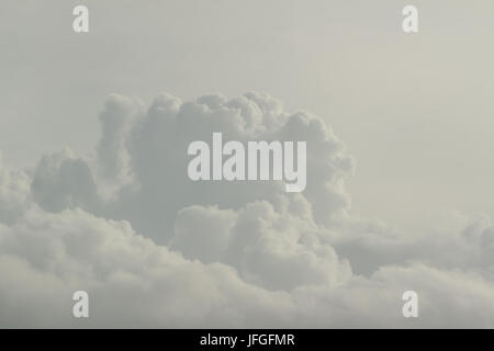 Cloudscape - white clouds over the sky; high key; Stock Photo