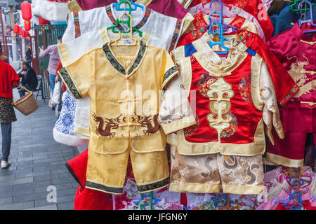 China, Shanghai, Yuyuan Garden, Shop Display of Traditional Childrens' Clothing Stock Photo
