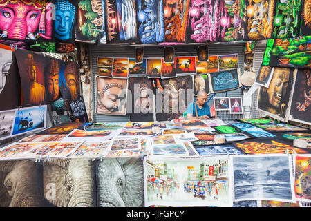 Thailand, Bangkok, Khaosan Road, Man Selling Paintings Stock Photo