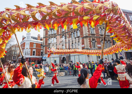 England, London, Soho, Chinatown, Chinese New Year Festival Parade, Dragon Dance Stock Photo