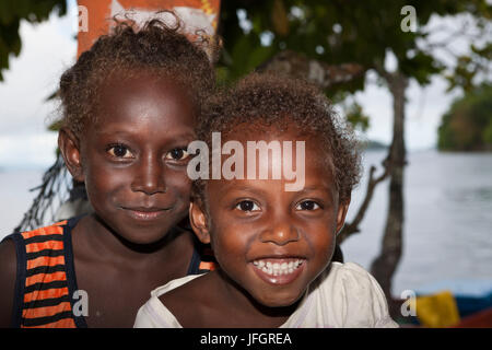 Children on the island Telina, Marovo lagoon, the Solomon Islands Stock Photo