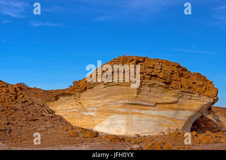 weather-beaten coloured sandstone rocks, beautyful clouds, Damaraland, Namibia Stock Photo