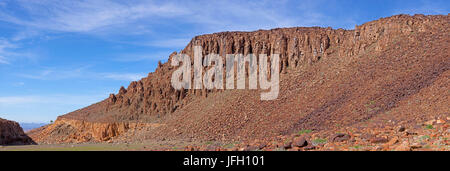 weather-beaten coloured sandstone rocks, beautyful clouds, Damaraland, Namibia, panorama Stock Photo