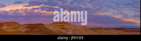 weather-beaten coloured sandstone rocks, evening beautyful clouds, Damaraland, Namibia, panorama Stock Photo