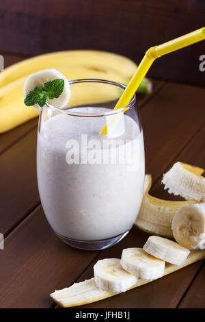 Healthy Banana smoothie on wooden background Stock Photo