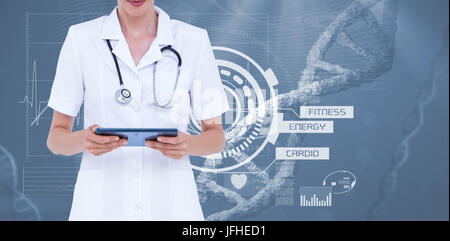 Midsection of female doctor using tablet computer Stock Photo