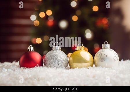 Composite image of Christmas baubles lined up Stock Photo