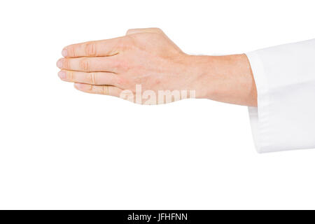Karate player making hand gesture on white background Stock Photo