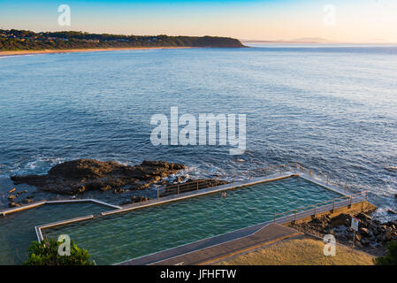 Looking out to sea over the ocean pool at Black Head Beach, NSW, Australia Stock Photo