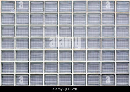 Glass building blocks in the wall Stock Photo