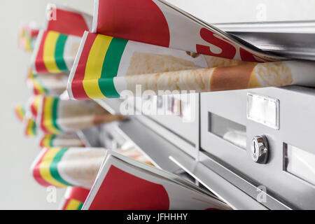 Brochures in mailboxes Stock Photo