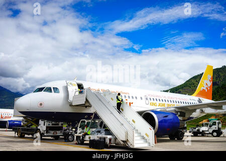 Thimphu, Bhutan - Aug 29, 2015. Airplanes docking at Paro Airport in Thimphu, Bhutan. Bhutan is a landlocked country and the second largest Himalayan  Stock Photo