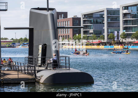 Dragonboat regatta in the inner harbor of Duisburg, Germany, racing in the scenery of old and new harbor buildings, the largest leisure time dragonboa Stock Photo