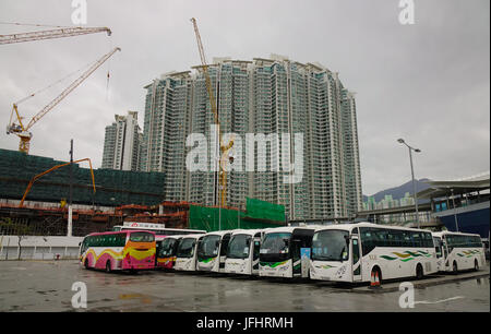 Hong Kong - Mar 31, 2017. Buses parking at the station in Hong Kong, China. Hong Kong ranks as the world fourth most densely populated sovereign state Stock Photo