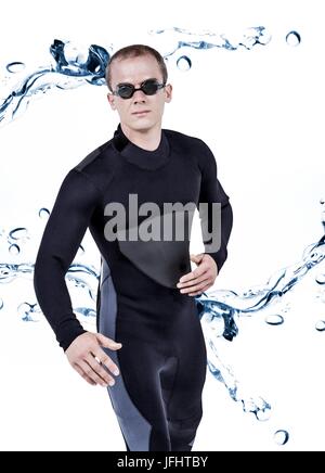 Composite image of swimmer in wetsuit and swimming goggles Stock Photo