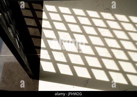 Shadows reflected on the floor Stock Photo