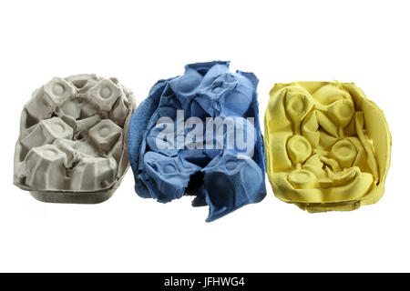 Crushed Egg Cartons on White Background Stock Photo