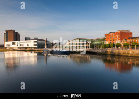 UK, Northern Ireland, Belfast, city skyline along River Lagan with Waterfront Hall, dawn Stock Photo