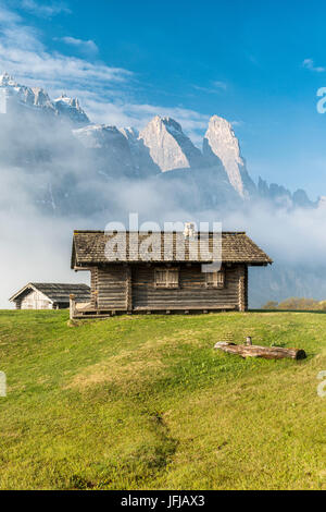 Passo Gardena, Dolomites, South Tyrol, Italy, Mountain hut in front of the mountains of the Sella group Stock Photo