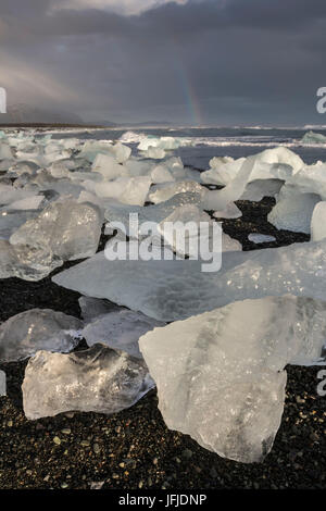Ice blocks on the black sand beach in Jokulsarlon Glacier Lagoon, Eastern Iceland, Europe Stock Photo