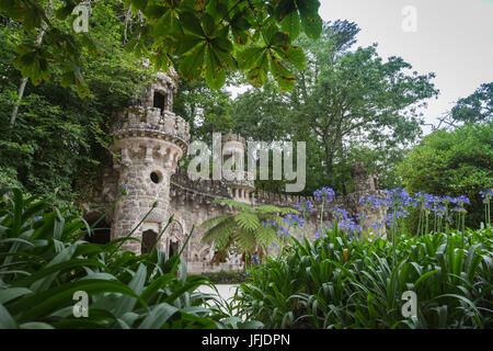 Mystical constructions of Romanesque Gothic and Renaissance style inside the park Quinta da Regaleira Sintra Portugal Europe Stock Photo