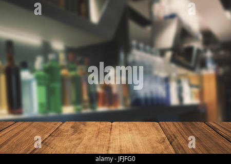 Composite image of bottles arranged on a shelf Stock Photo