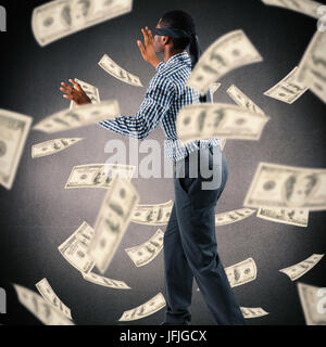 Composite image of blindfolded businessman with arms out Stock Photo