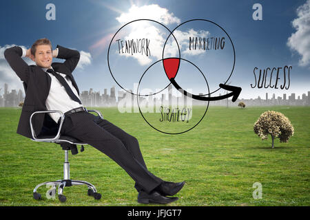 Composite image of businessman relaxing in swivel chair Stock Photo