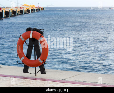 personal life ring on the dock seaside Stock Photo