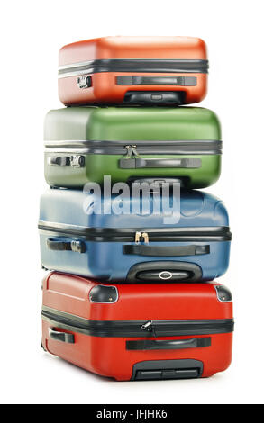 Luggage consisting of four polycarbonate suitcases isolated on white Stock Photo