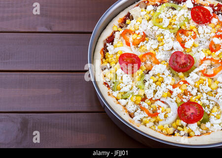 Uncooked homemade pizza Stock Photo