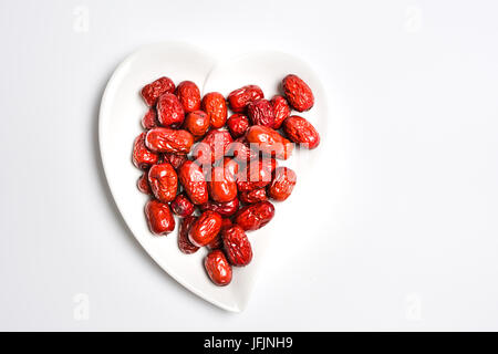 Jujube, Chinese dried red date fruit on a plate Stock Photo