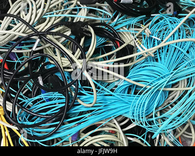 network cables and power cables in a pile for disposal Stock Photo