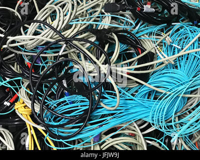 network cables and power cables in a pile for disposal Stock Photo