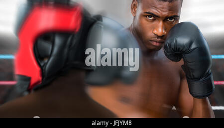 Composite image of rear view of boxer standing Stock Photo