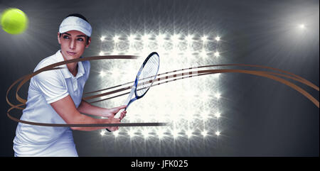 Composite image of female athlete playing tennis Stock Photo