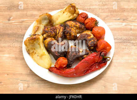 BBQ chicken wings with vegetables Stock Photo
