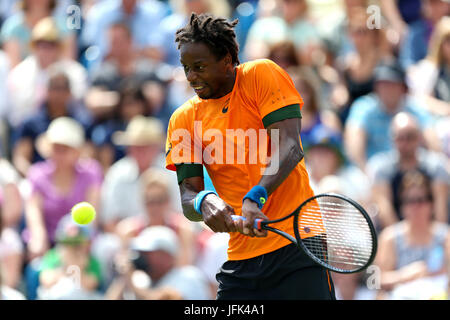 France's Gael Monfils in action against Serbia's Novak Djokovic in the Men's Singles Final during day nine of the AEGON International at Devonshire Park, Eastbourne. Stock Photo