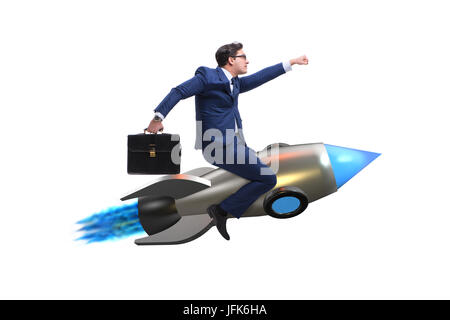 Businessman flying on rocket in business concept Stock Photo